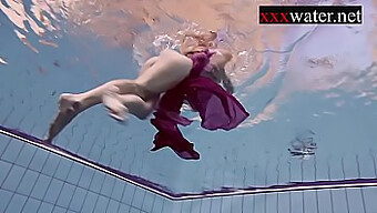 Sizzling Russian Redhead Takes A Swim In The Pool