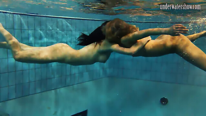 Breathtakingly Stunning And Seductive Young Women Swimming Underwater In The Great Outdoors